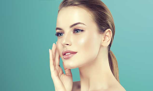 XERF radiofrequency skin tightening London - woman in profile touching her cheek Woman in profile touching her cheek, XERF radiofrequency skin tightening London